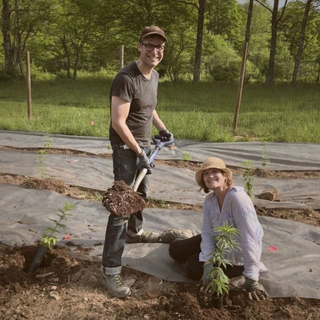 Andrew Rosner, left, and his partner Kristen Hallet work on their farm, HR Botanicals in Long Eddy, NY.